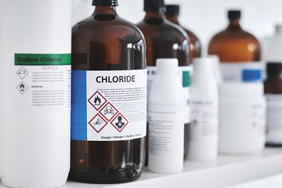 Shot of bottles of chemicals on a shelf in a lab